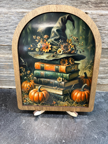 Arch Hat on Books Framed Art
