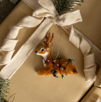 RESTING FESTIVE FUR DEER ORNAMENT